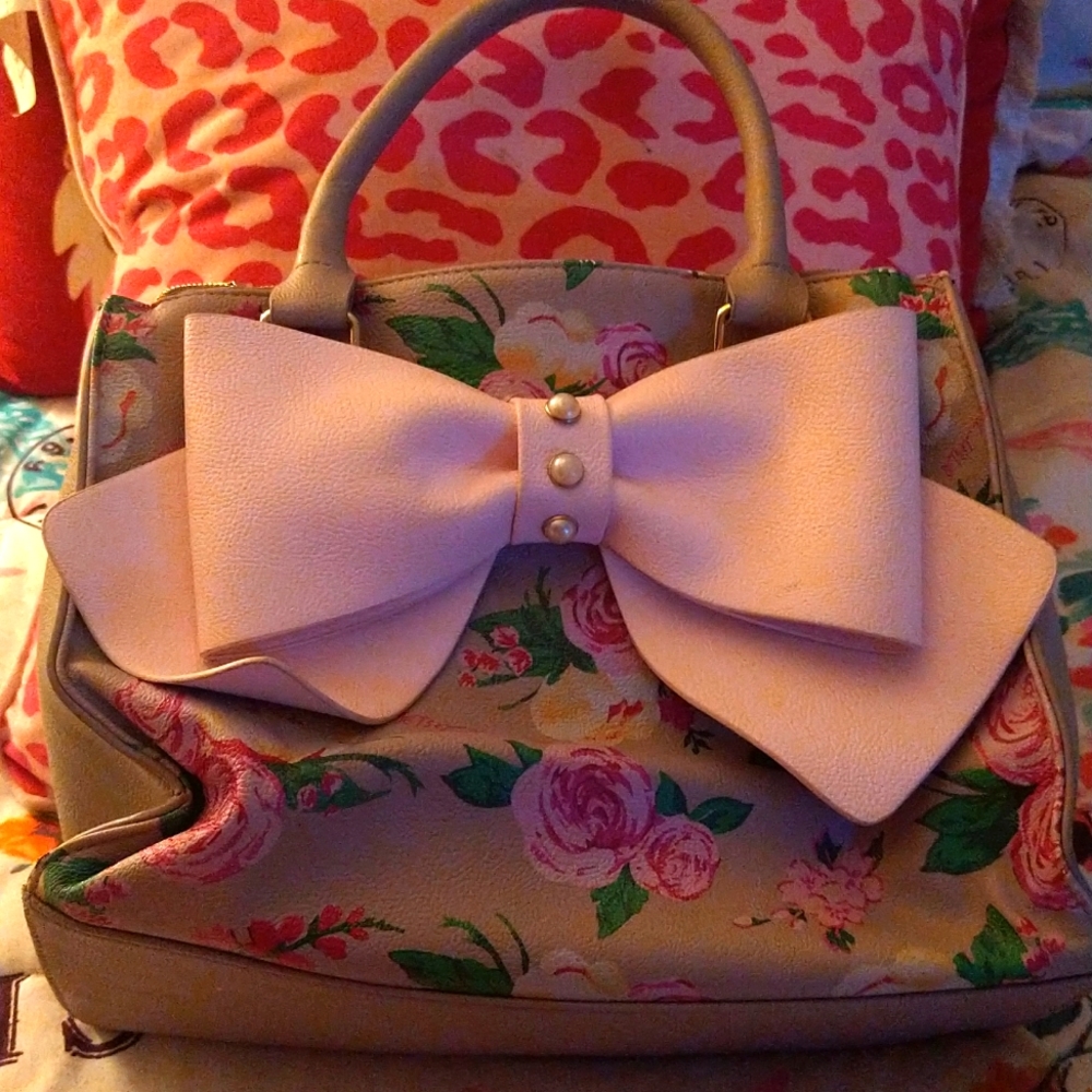 Never been used adorable Betsey Johnson  lavender with pink bow purse.